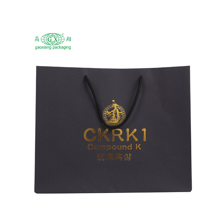 Eco friendly custom logo gift bags matte laminated boutique private label elegant paper bag with gold ribbon