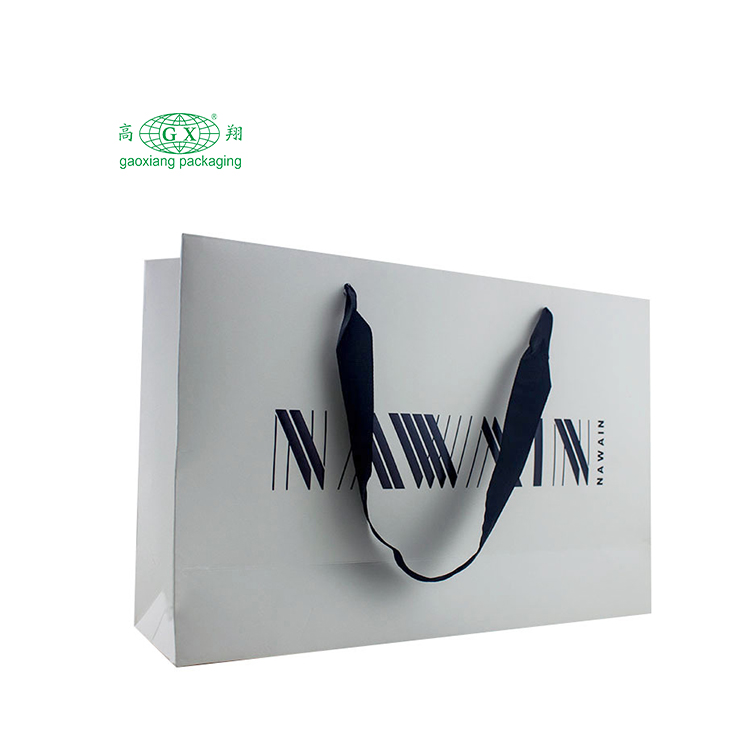 Custom shopping bags clothing gold printed logo design white cardboard paper packaging bags for retail